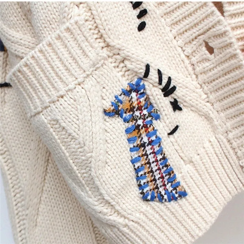 Emily - eleganter gestrickter Pullover mit Stickereien