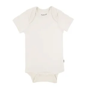 Kyte Baby Short Sleeve Bodysuit  in Oat
